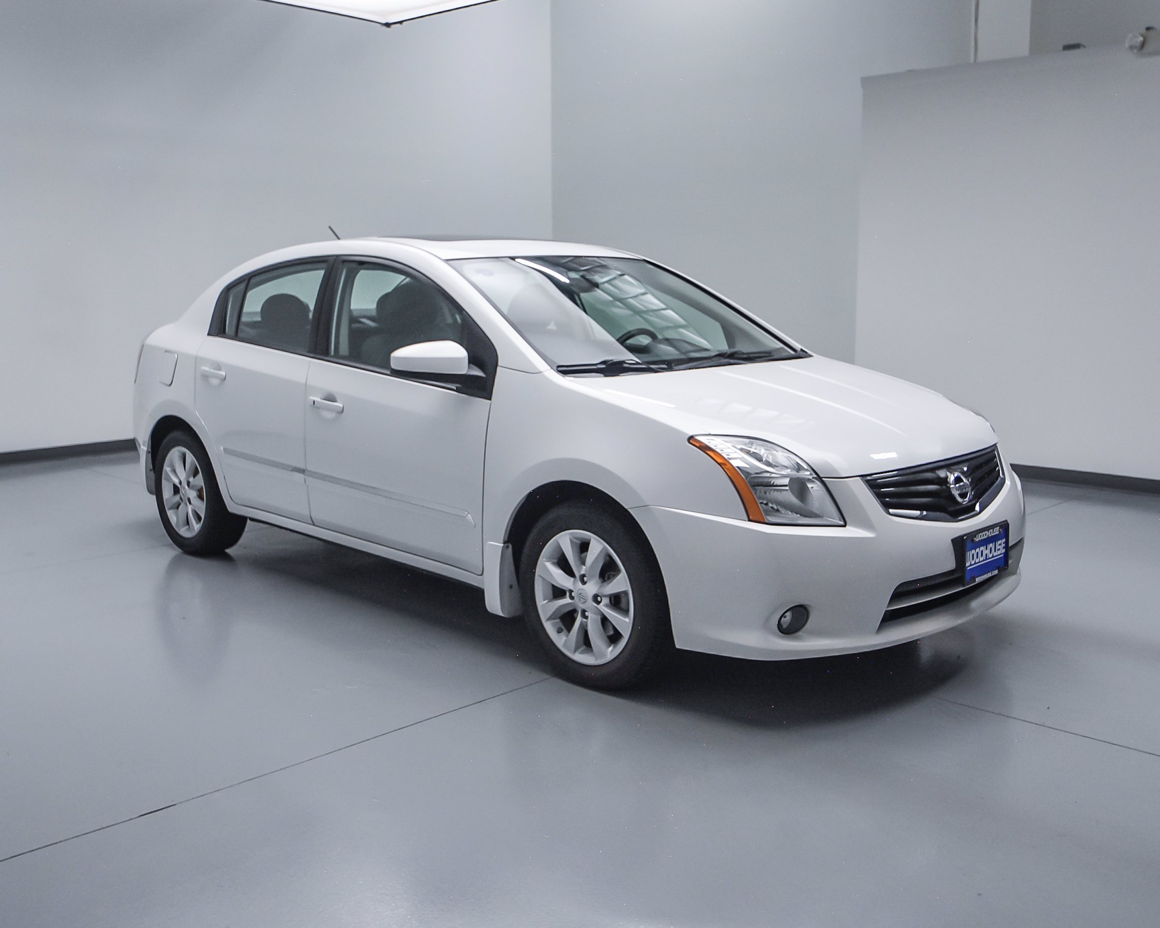 PreOwned 2010 Nissan Sentra 2.0 SL FWD 4dr Car